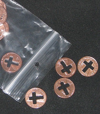 cross cut pennies, 50 pennies with a cross cut out