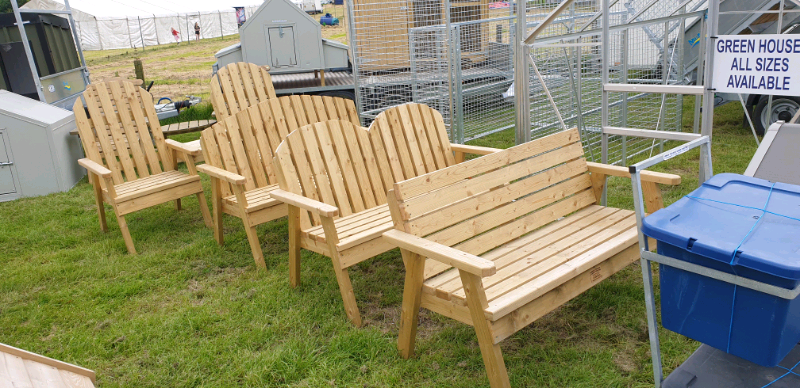 Clearance lines on these pressure treated wooden garden benches | in