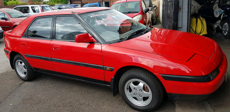 Mazda 323f разболтовка