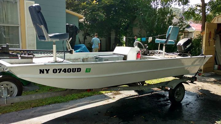 Sea Nymph Bass Boat with trailer and 25 horsepower Mercury Outboard