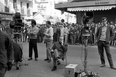 Italian director Luchino Visconti preparing a scene on The Strange- Old Photo 6