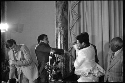 American boxers Muhammad Ali and Leon Spinks pretend to fight duri- Old Photo