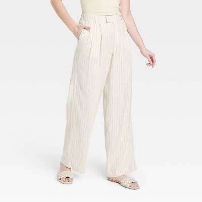 

Широкие струящиеся брюки из льна с высокой посадкой для женщин - Новый день