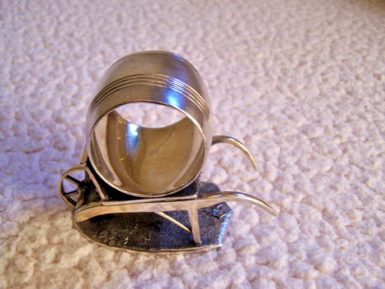ANTIQUE JAMES W. TUFTS SILVERPLATED NAPKING RING 