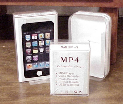 MP4 MULTIMEDIA PLAYER AND TWO IPOD TOUCH 3 TOTAL CASES EMPTY STORAGE CASES ONLY