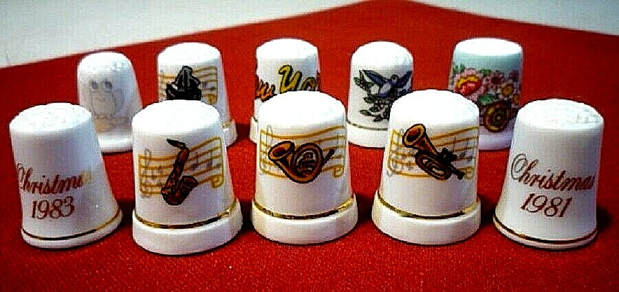 Ten vintage porcelain thimbles with designs. Collectible thimbles