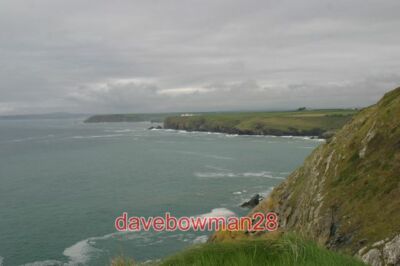 PHOTO  POLURRIAN COVE FROM HENSCATH POLDU POINT IS IN THE MID DISTANCE (WITH POL