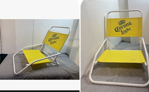 pair of corona light yellow low sitting beach chairs folding