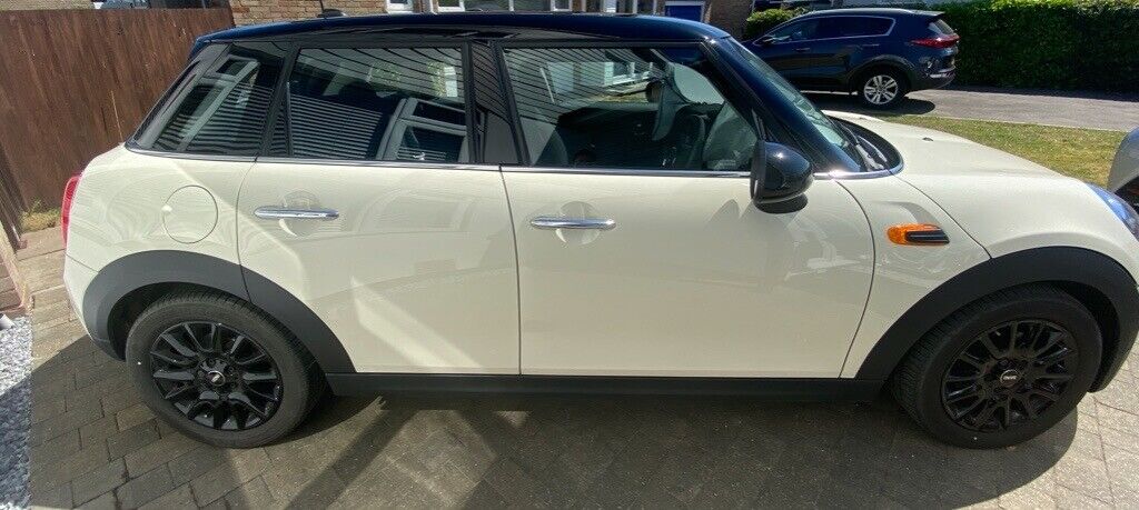 Immaculate, very low mileage, 5 door Mini Cooper in Pepper White with black roof and alloys in