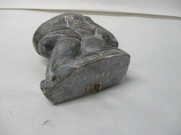 Vintage Inuit Soapstone Carving Depicting Hunter with Seals