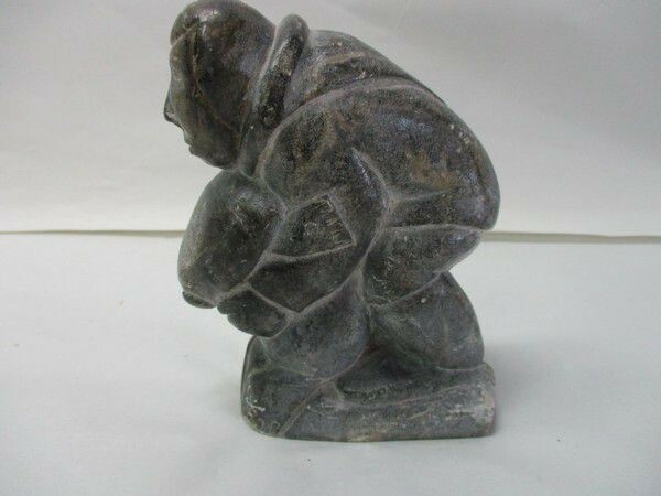 Vintage Inuit Soapstone Carving Depicting Hunter with Seals