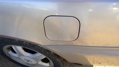 CL        1997 Fuel Filler Door 323140