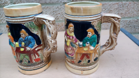 A pair of vintage beer mugs 