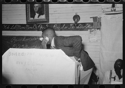 Photo:Negro preacher wiping face at revival meeting, La Forge, Missouri