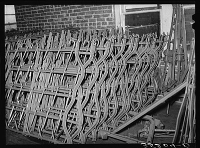 Spike-tooth harrow parts. Farm equipment warehouse, Oklahoma City, Oklahoma