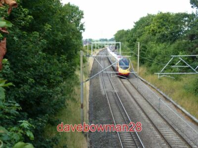 PHOTO  SOUTHBOUND VIRGIN PENDOLINO TRAIN IRONICALLY JUST A COUPLE OF DAYS AFTER