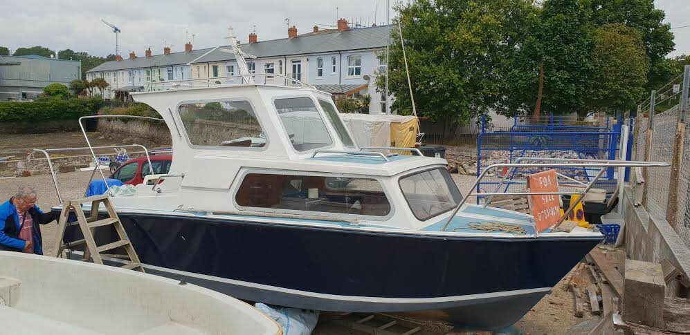 Small Cabin Cruiser With 50hp Suzuki Tilt Outboard Motor In