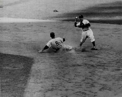 Phil Rizzuto New York Yankees turns a double play against the Broo- Old Photo