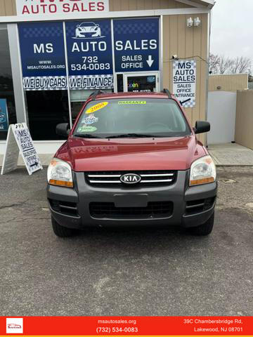 Kia Sportage Red with 146369 Miles, for sale!