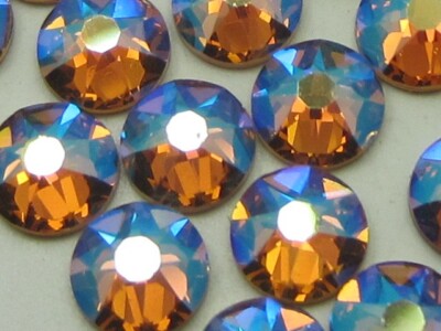 34ss LT. CO TOPAZ  SHIMMER HOT FIX European Rhinestones 12pcs.