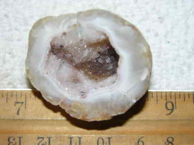 Agate geode half cut and polished with druzy crystal filled center 1.5'' U83