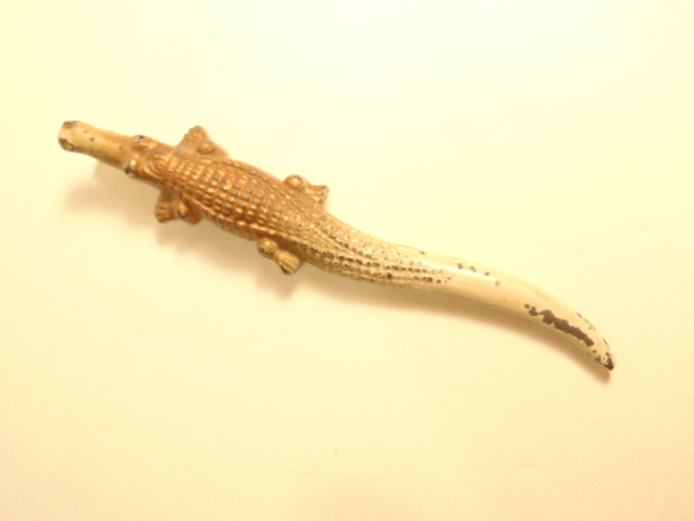 Vintage cast non-ferrous metal alligator marked Made in USA on bottom.