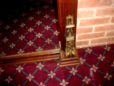 ANTIQUE EAST LAKE MIRROR, SURRONDED BY HAND CARVED WALNUT ORNATE FRAMING