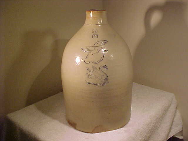 ANTIQUE SALT GLAZE STONEWARE TWO GALLON INCISED SWAN & FLYING EAGLE JUG.