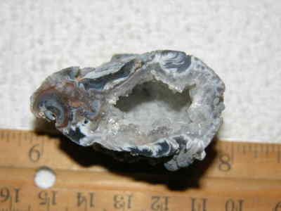 Agate geode half cut and polished with druzy crystal filled center 2'' U40