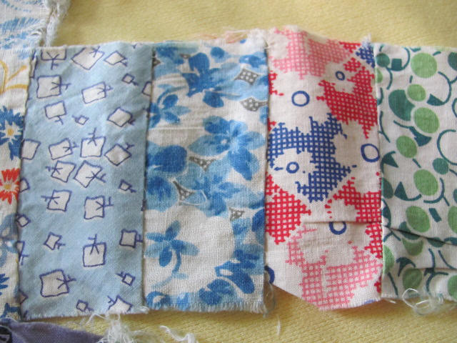 81 hand stitched Double Wedding Ring quilt blocks 1930's prints