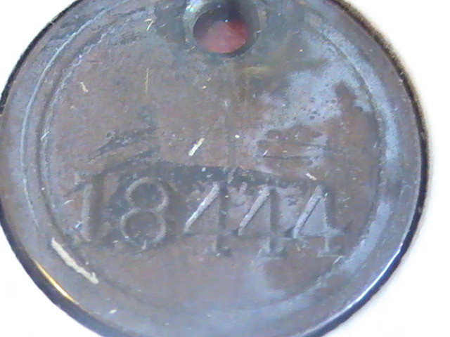 TOKEN GOOD FOR 5 CENTS TRADE TOKEN NO 18444 PUNCHED ON REVERSE