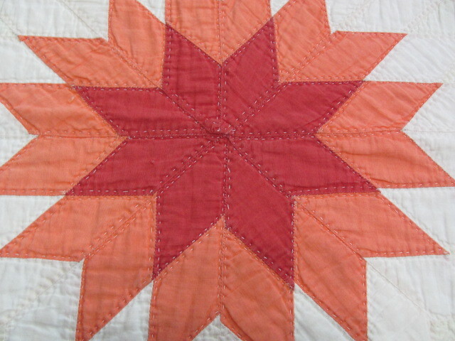 Antique Texas Lone Star quilt in red and coral hand quilted from estate