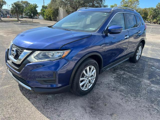 Blue Nissan Rogue with 56617 Miles available now!