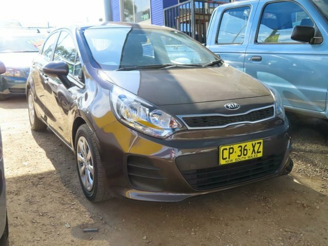 Kia rio коричневый