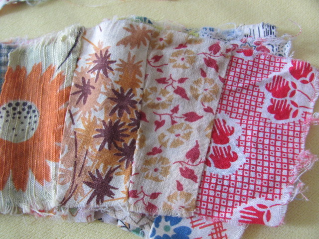 81 hand stitched Double Wedding Ring quilt blocks 1930's prints