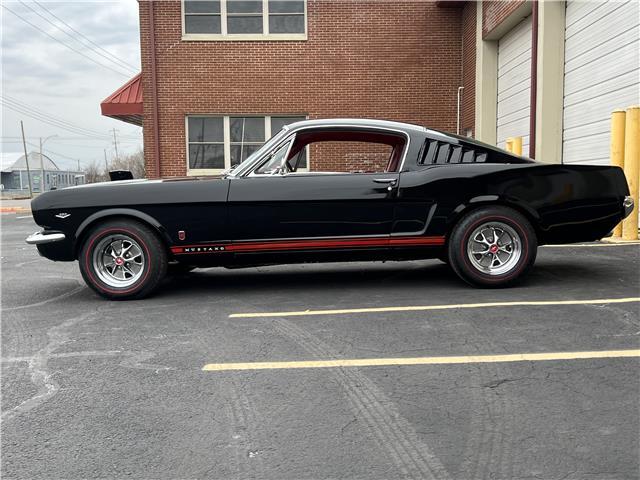 Owner 1965 Ford Mustang fastback Raven black 5 speed fully loaded