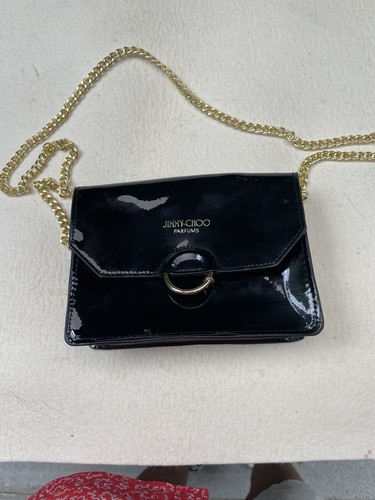 バッグ・カバンその他 Jimmy Choo Black leather Zandra bag with gold pendant Jimmy Choo Black leather Zandra bag with gold pendant