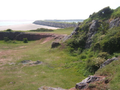 Photo 6x4 Near Hodbarrow Point, sea wall curving away in the distance Mil c2006
