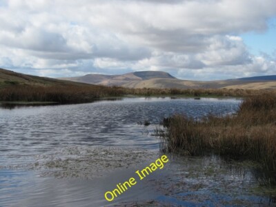Photo 6x4 View across pond to Fan Gyhirych Heol Senni A nicer day than wh c2012