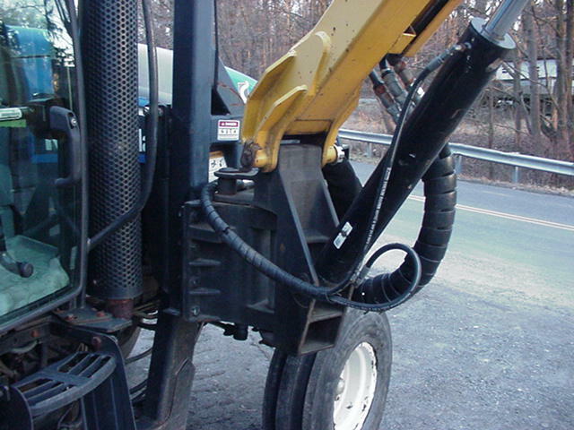 2005 NEW HOLLAND TS115 TRACTOR W/ ALAMO MACHETE BOOM MOWER BUSH HOG