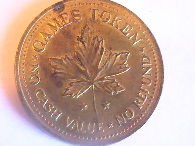 TOKEN Canada Maple Leaf Games No Cash Value No Refund Clown Amusement Token