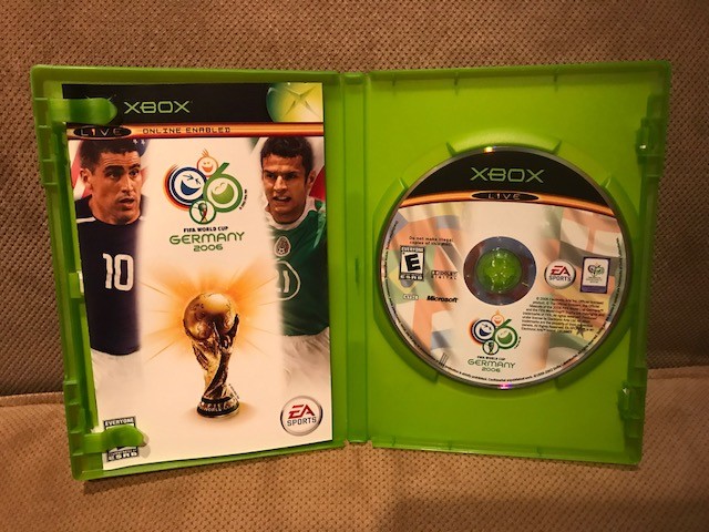 xbox game lot, Madden 07, MVP Baseball 2004, NCAA 06 March Madness, FIFA Germany