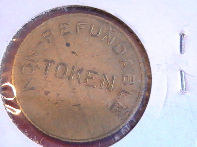 TOKEN REGINA'S MOVIES NON-REFUNDABLE BRASS 1 INCH