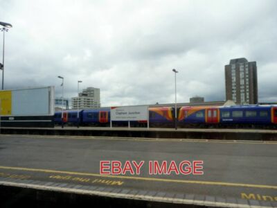 PHOTO  CLAPHAM JUNCTION STATION LOOKING ACROSS THE PLATFORMS FROM THE SOUTHBOUND