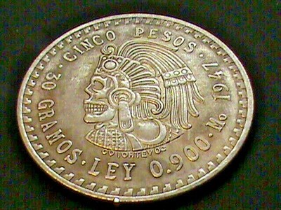 1947~Cinco Pesos Obverse~DESIGN~2 Headed Skull~1921~Morgan Dollar Obverse DESIGN