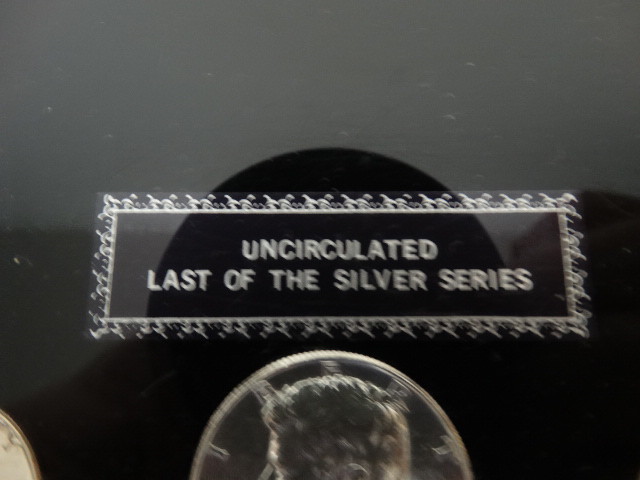 1964 UNCIRCULATED MINT SET PRESERVED IN CLEAR ACRYLIC