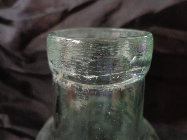 Antique Green Medicine Bottle w/large mouth opening, bubbles J K & S W on bottom