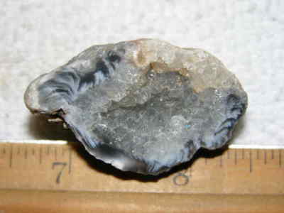 Agate geode half cut and polished with druzy crystal filled center 1.5'' U94
