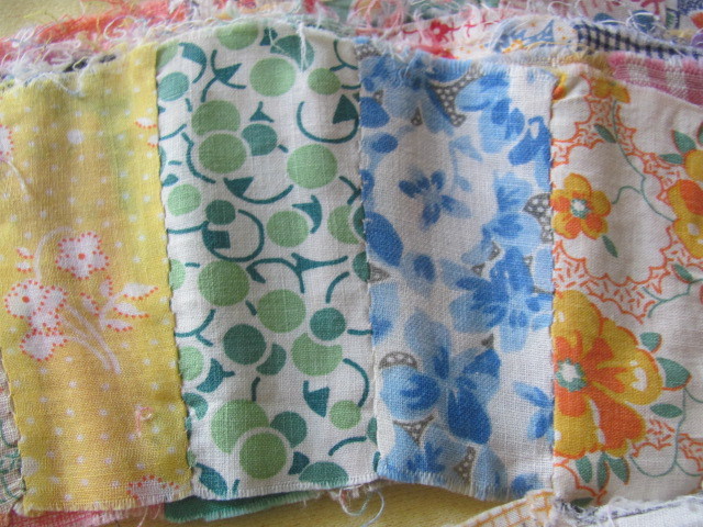 81 hand stitched Double Wedding Ring quilt blocks 1930's prints