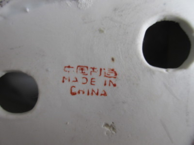 # 7 figurine of a women made in China hand painted 9.5